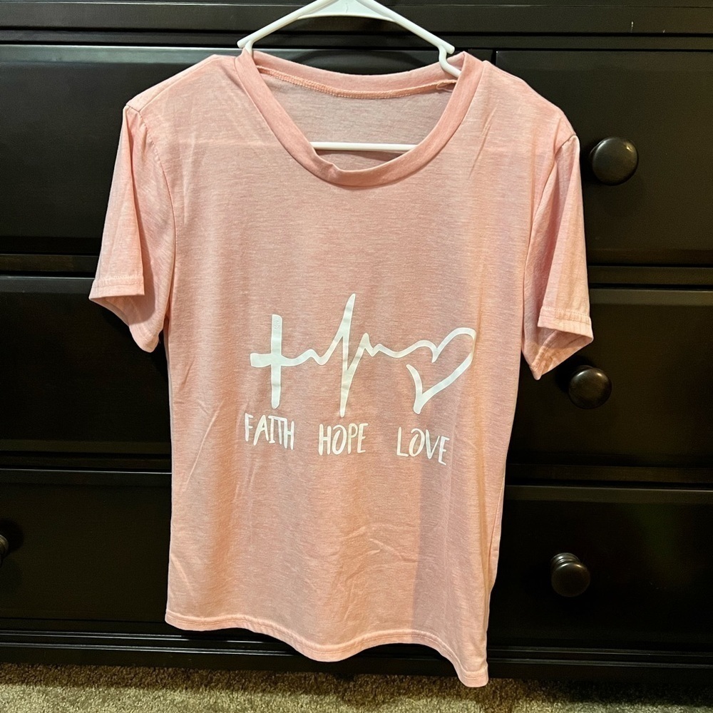 LIGHT pink t-shirt. Size medium.
